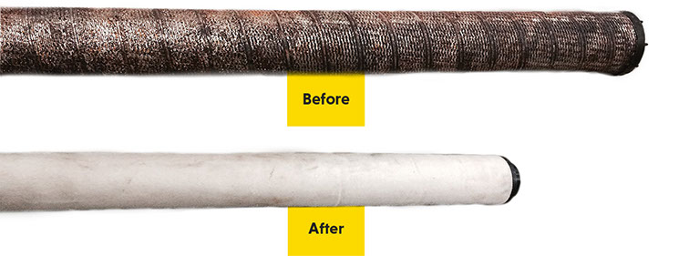 Gas filter before treatment, coated in dark radioactive scale